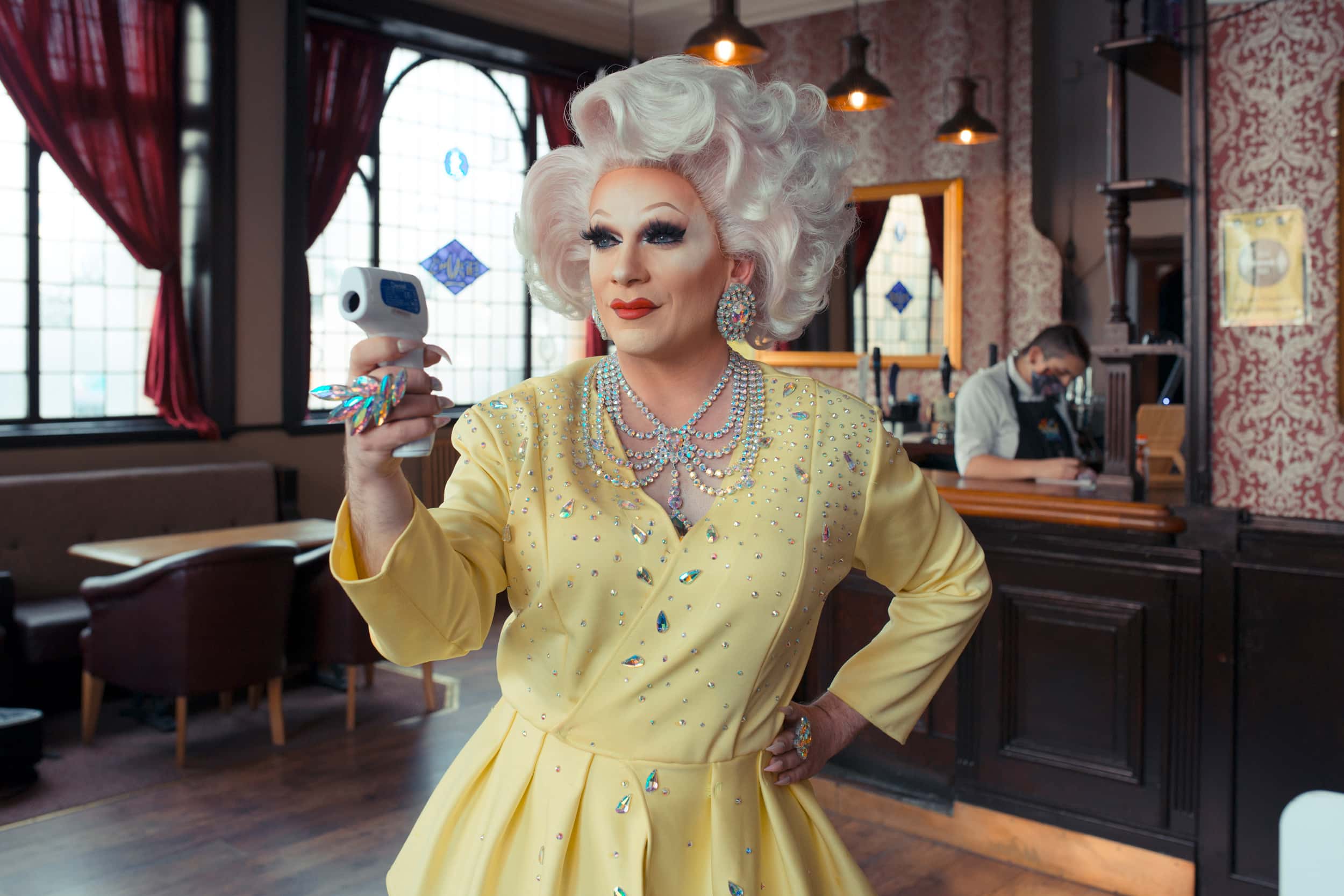 A portrait of mary gold at LGBT venue, golden cross photographed for omnigov in association with guardian labs.
