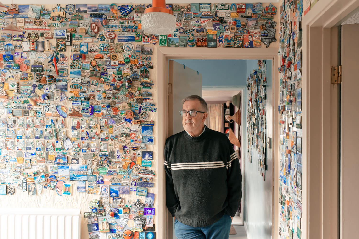 Tony Lloyd, photographed at his home in Cardiff with some of his 5500 magnets.